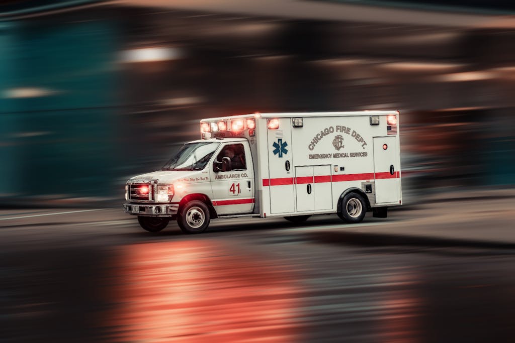 Dynamic capture of a Chicago Fire Dept ambulance rushing through city streets for an emergency 911 transport.